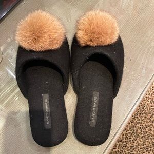 Black slippers with Pom Pom’s